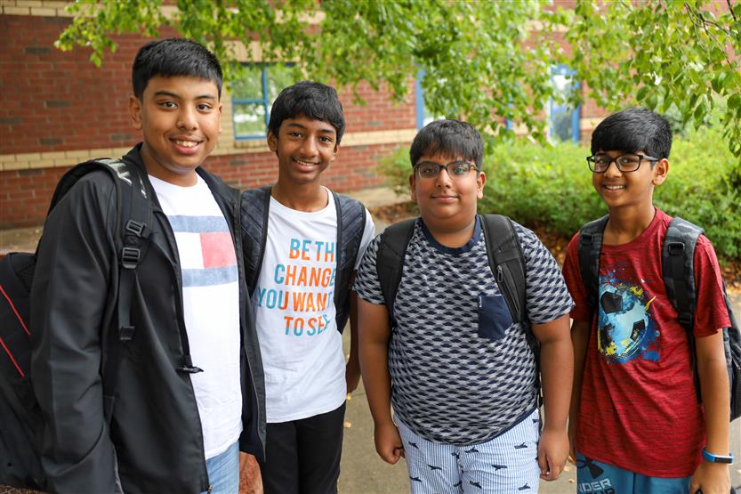 People smile on the first day of school
